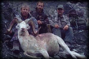 Dave Ueling (left) of Onalaska, WI with Dan Mielke (center) & Joe Poluncz (right) with his opening day Dall Ram.