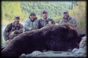 Scott McNown of Windfield, KS with his Brown Bear. Braun Kosack (left), assistant guide Lance Kopsack and Adam Flod of PA (far right).