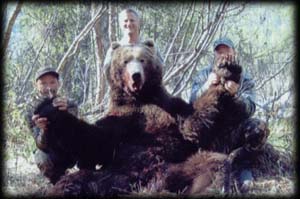 Russel Robinson (center) of Bremerton, WA & Ron Kaufman of Auburn, WA with their 10'+ Spring Brown Bear